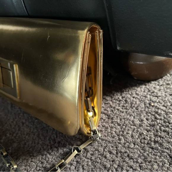 NWT - Olga berg gold clutch bag. NWT. Comes with chain strap. Rectangular clasp. - Picture 6 of 15